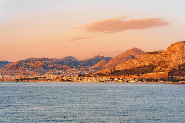 Sunrise at the Mediterranian sea and in Palermo old city, Sicily island, Italy