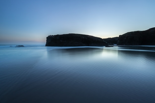 Sunrise at one of the most famous beaches in Spain, Las Catedrales!