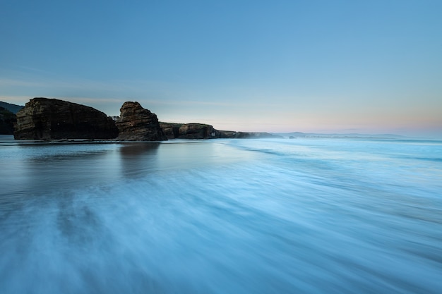 Sunrise at one of the most famous beaches in Spain, Las Catedrales!