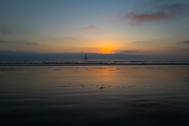 Sunrise over the sea and beautiful cloudscape colorful ocean beach sunset