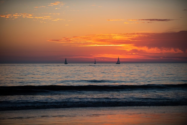 Sunrise over the sea and beautiful cloudscape Colorful ocean beach sunset