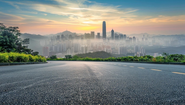 Sunrise over shenzhen empty asphalt road city skyline and nature landscape in panoramic view