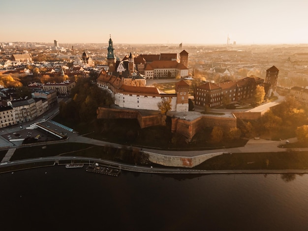 Sunrise view Wawel Castle and Gothic Cathedral in Cracow Poland Renaissance Sigismund Chapel with golden dome fortified walls