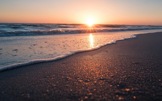 Photo sunrise warming the sand on a quiet beach