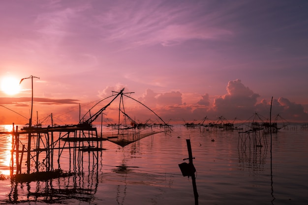 Sunrise with fishing trap in pak pra village, Phatthalung Thailand