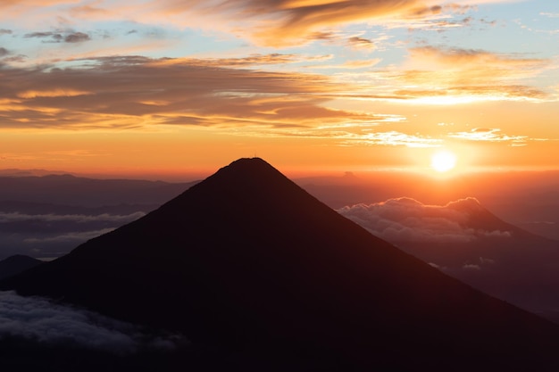 Sunrising behind volcano de agua