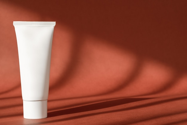 Sunscreen cleanser in plastic white tube