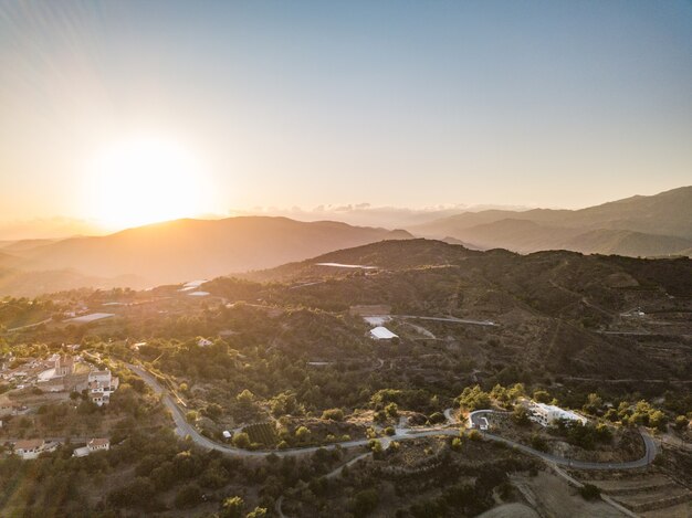 Sunset Aerial view of old mountain Cyprus village Agios Amvrosios, Cyprus 2020