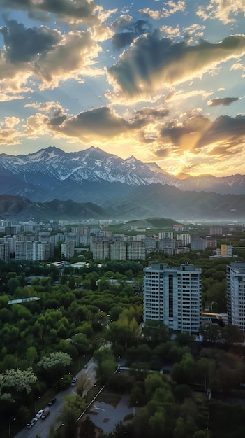 Sunset over Almaty showcasing the city skyline with mountains in the background