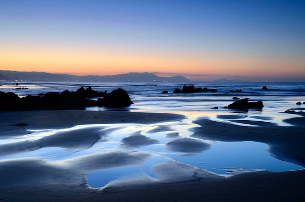 Sunset on Barrika beach. Biscay. Basque Country. Spain