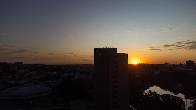 Sunset beautiful sunset over a small town in Brazil drone photo