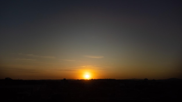 Sunset beautiful sunset over a small town in Brazil drone photo