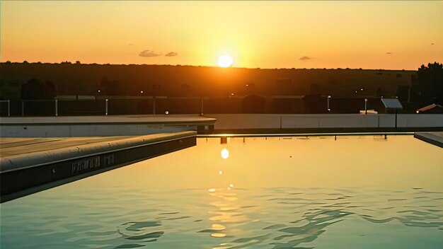 Sunset by the pool a magical moment of sunset reflected in a crystal clear pool