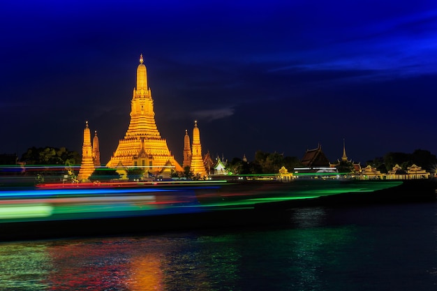 Sunset city skyline at Wat Arun temple and Chao Phraya River Bangkok Thailand