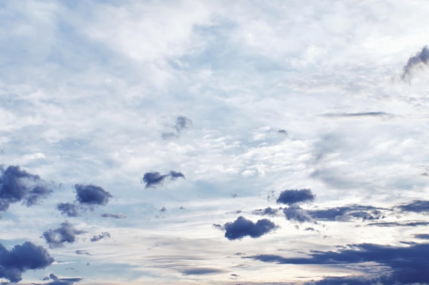 Sunset clouds with sun setting down Beautiful evening sky with clouds background