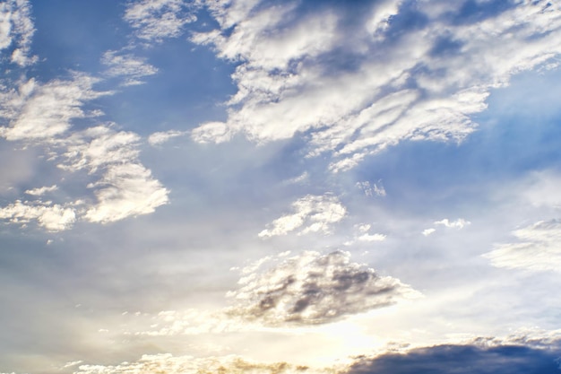 Sunset clouds with sun setting down Beautiful evening sky with clouds background