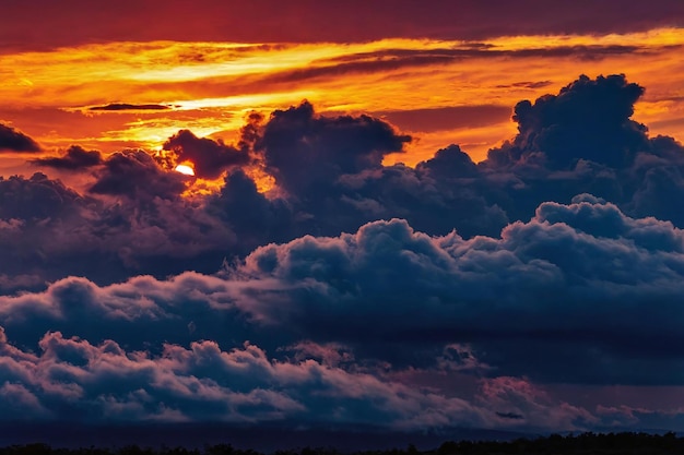 Photo sunset behind clouds