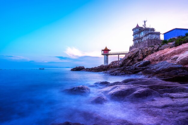 Sunset and coastline and lighthouse