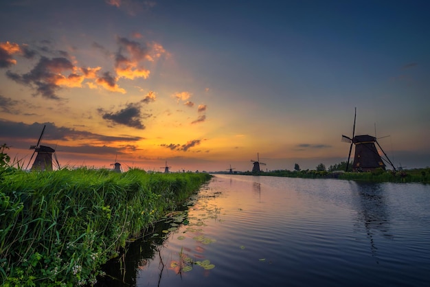 Sunset above historic windmills in Kinderdijk Netherlands