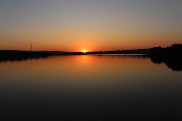 A sunset over a lake