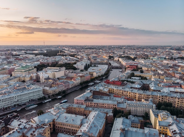 Sunset landscape of fontanka river and old houses in st petersburg