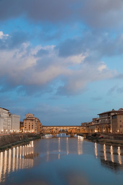 Sunset light on Ponte Vecchio Old Bridge in Florence Italy