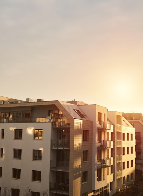 Sunset in modern lowrise flat house district European contemporary real estate with loft flats