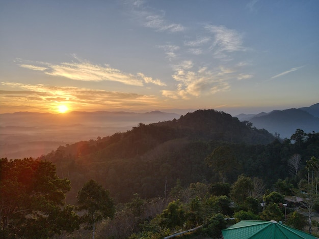 Sunset mountain forest cloud blue sky background