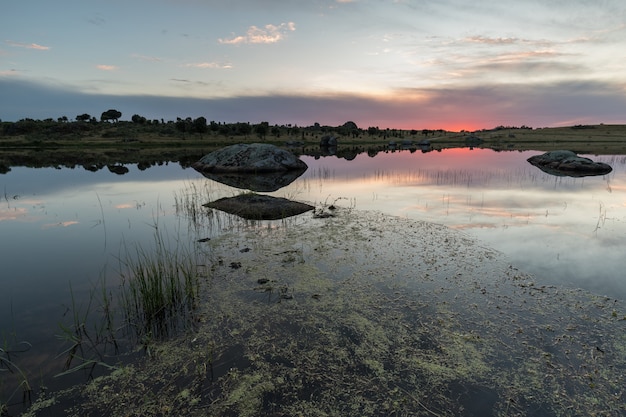 Sunset in the natural area of the Barruecos. Extremadura. Spain.