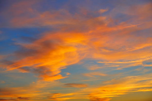 Sunset orange clouds in a blue sky