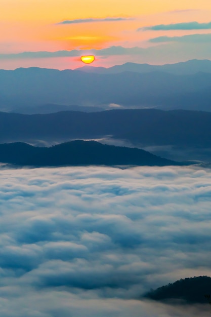  sunset overlooking mountains with Mist