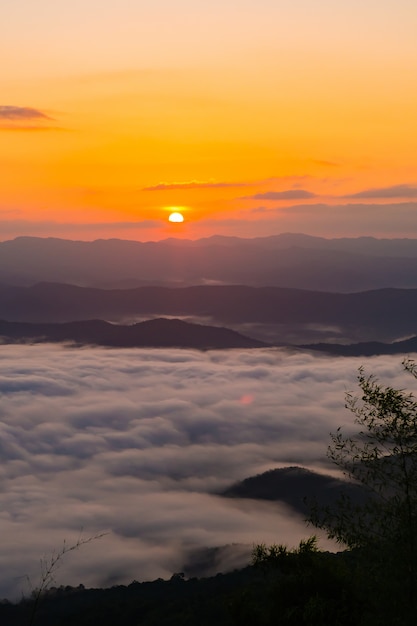  sunset overlooking mountains with Mist