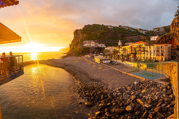 Sunset in Ponta do Sol Madeira aerial view of the beach in summer Portugal