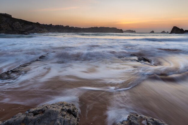 Sunset in the Portio Beach. Liencres. Cantabria. Spain.