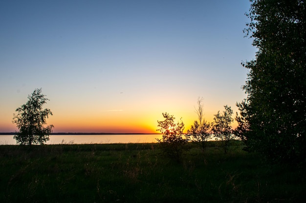 Sunset on the river bank