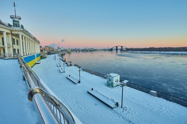 Sunset over the river Dnieper on winter