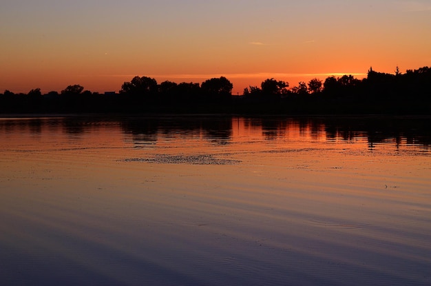 Sunset on the river in summer