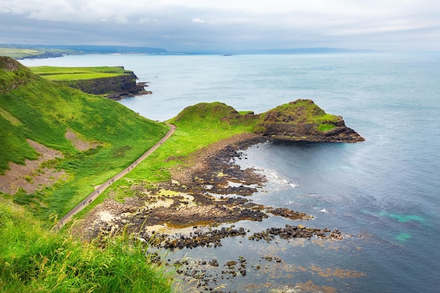 Sunset over rocks formation giants causeway county antrim northern ireland uk