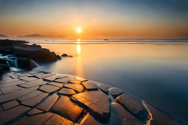 a sunset over a rocky beach with a sunset in the background