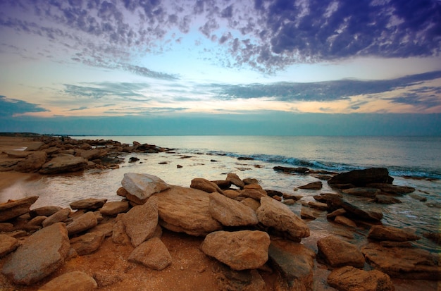 Sunset over rocky coast