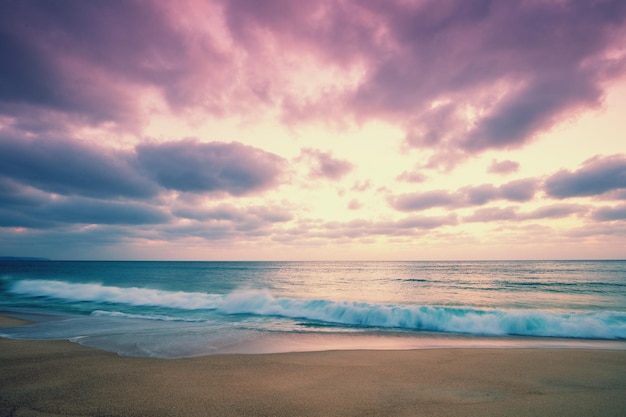 Sunset over the sea Atlantic ocean in evening sandy beach