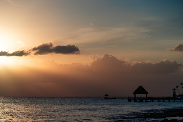 Sunset over sea and beach vacation and travel concept