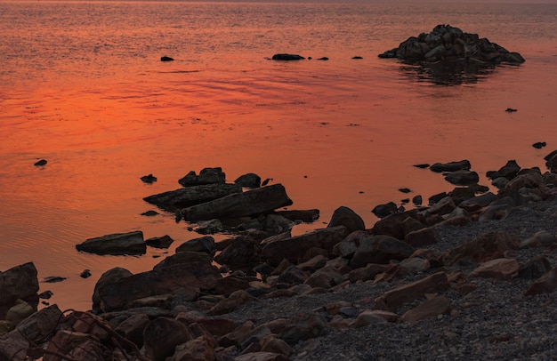 Sunset over the sea horizon