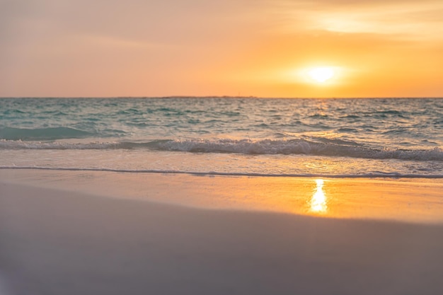 Sunset sea landscape Colorful ocean beach sunrise Beautiful beach scenery with calm waves and soft