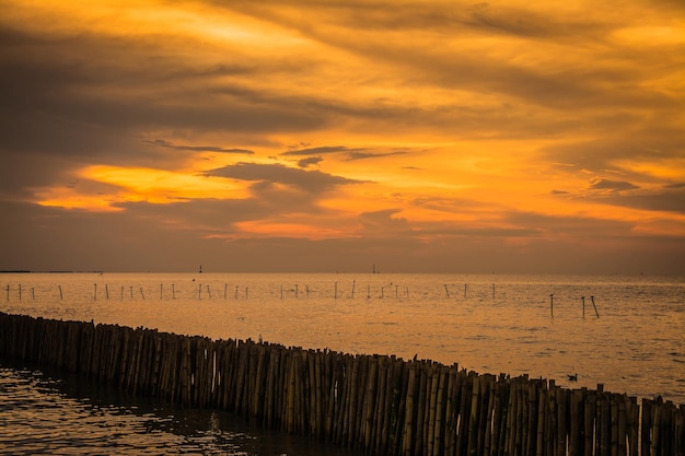 Sunset sky with dramatic sunset clouds over the sea Beautiful sunrise over Ocean