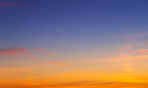 Sunset sky with pink and gray clouds