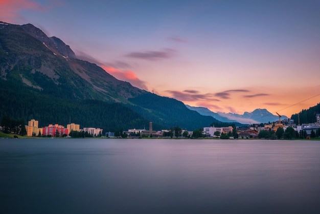 Sunset above St Moritz with lake and Swiss Alps in Switzerland