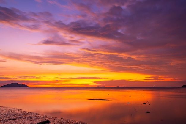 Sunset or sunrise sky clouds over sea sunlight in Phuket Thailand Amazing nature landscape seascapeBeautiful light nature landscape colorful background