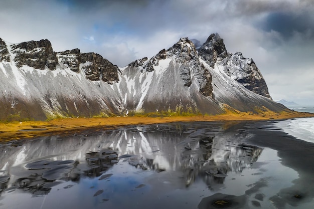 Photo sunset at vestrahorn mountain and stokksnes beach aerial view