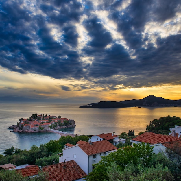 Sunset view of famous Sveti Stefan island in Montenegro